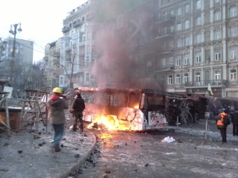 Bus torched by pro-EU demonstrators in Kyiv.