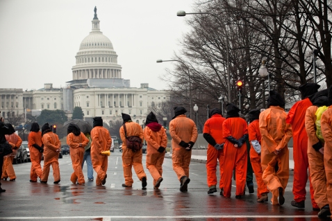 Amnesty International USA activists protest the 10th anniversary of the Guantanamo Bay detention centre, Washington DC, USA, 11 January 2012. - AIUSA